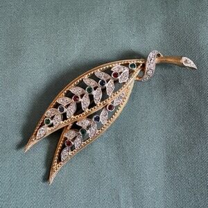 Kramer Vintage Brooch Leaf Rhinestones Red Green Gold Tone Pin 60s 3"